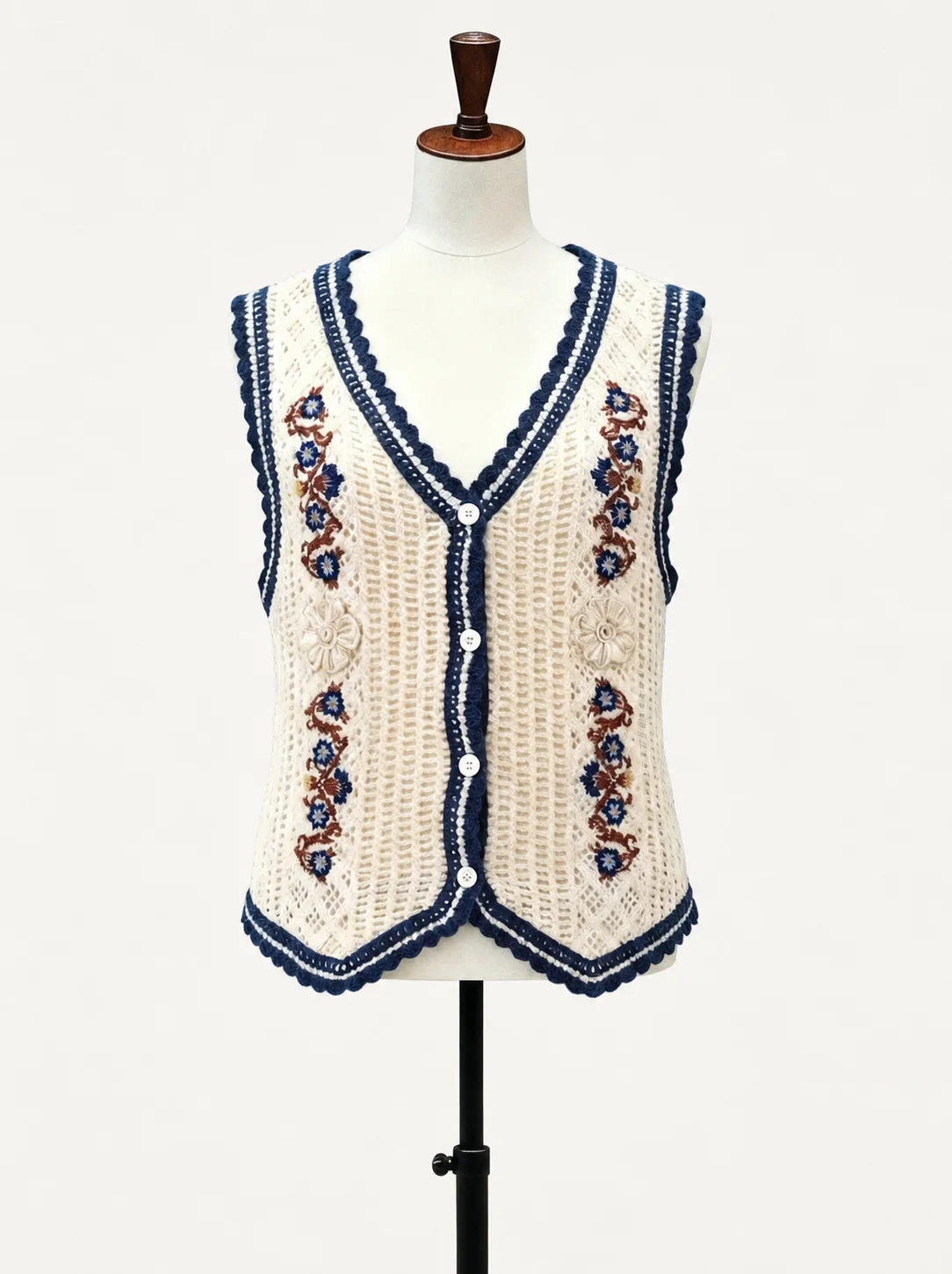 Wholesale ivory navy botanical crochet-look vest for OEM and private label production